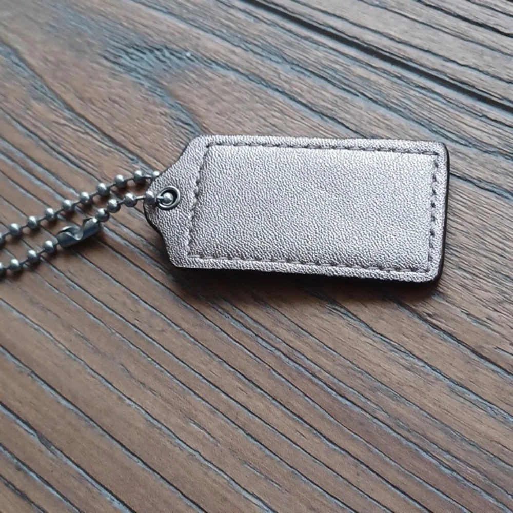 Coach Matallic Gold Color Keychain Tag